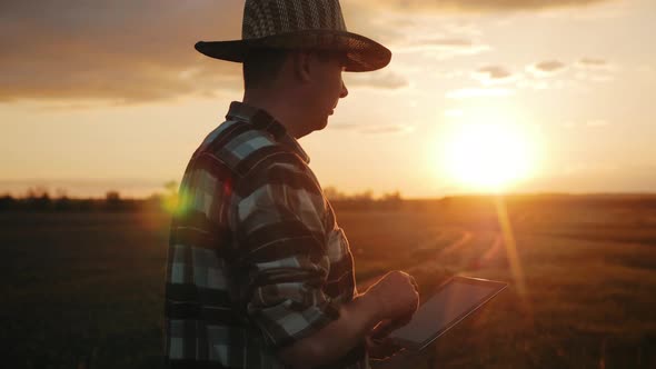 Smart Agriculture Technology Farmer Holding Tablet with Smart Technology