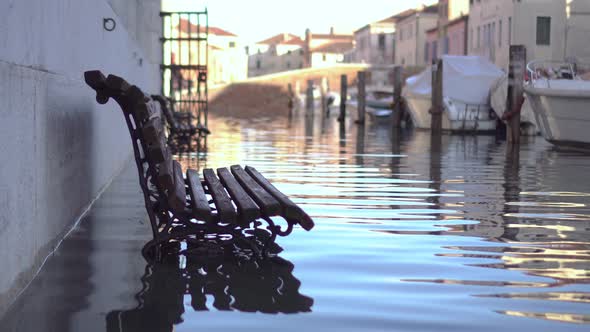 Bench in the City Flooded By Water