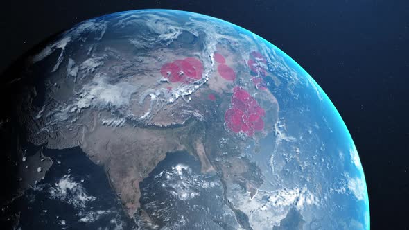 Animation of the planet earth spinning around and countries turning red through circles  alt