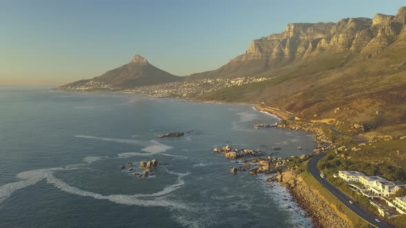 Scenic wide aerial Drone view of coastal Oudekraal Nature Reserve, Twelve apostles mountains, South