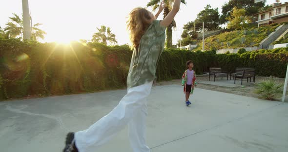 Mom and Boy are Playing Basketball