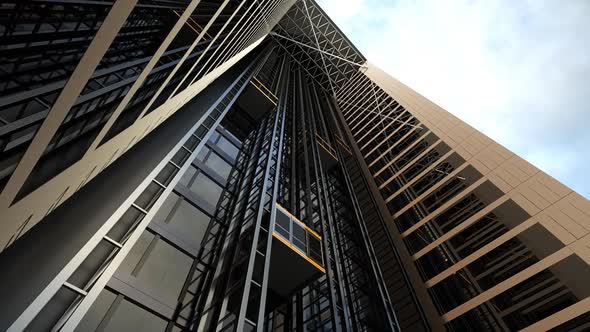 The modern building with the elevator shaft on the front of the facade.