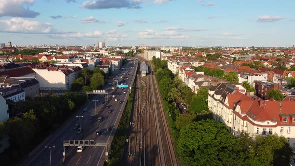 Berlin S-Bahn Subway and Autobahn freeway ring.Great aerial view flight fly forwards drone footage
