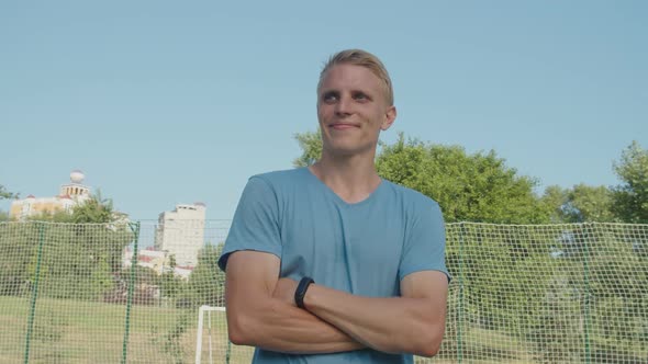 Portrait of Handsome Young Adult Nordic Male Sportsman Outdoors