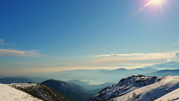 Amazing panning of alpine mountain range in Italy on sunny day