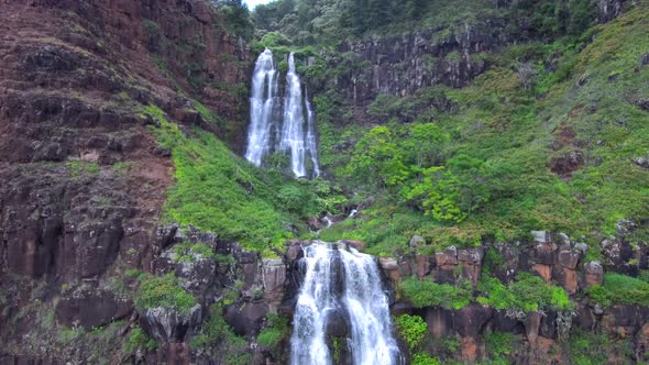 Follows the falling water of Jurassic Falls