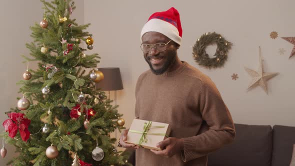 Happy African-American Man Posing at Christmas