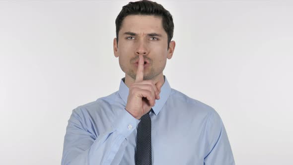 Finger on Lips, Gesture of  Silence By Businessman