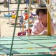 Cute Asian Child Climbing Rope At The Playground - VideoHive Item for Sale
