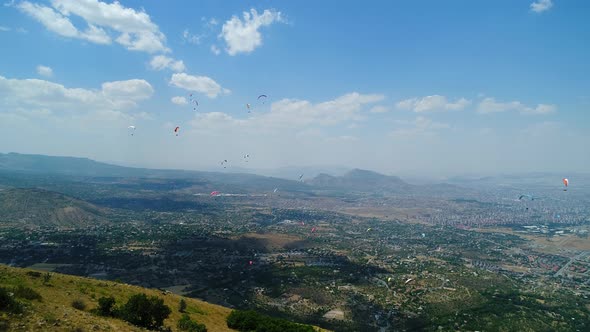Paragliders In The Deep Blue Sky