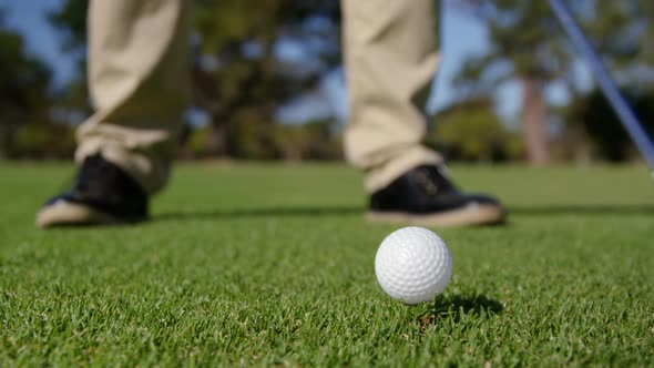 Golfer playing golf