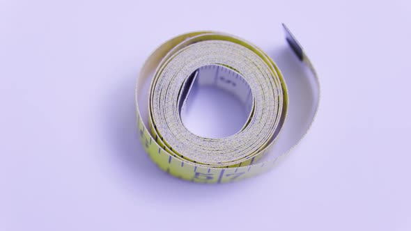 Close Up of a Measuring Tape Rotating