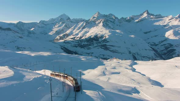 Matterhorn Mountain and Gornergrat Train in Winter at Sunset