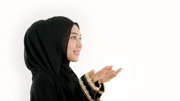 Asian Muslim Woman Praying at Home