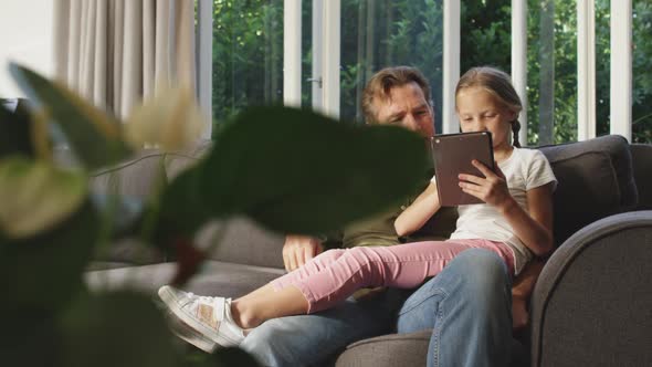 Grandfather and granddaughter spending time together