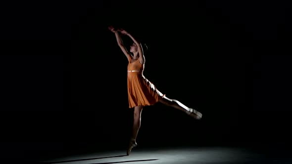 Curly Girl Dancing Ballet in Studio