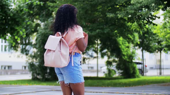 African Student Girl with Notebooks in City