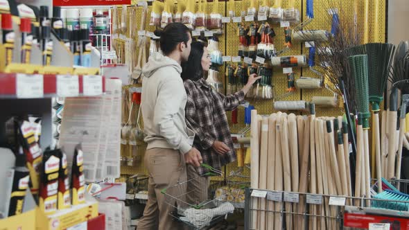 Couple Shopping at Hardware Store
