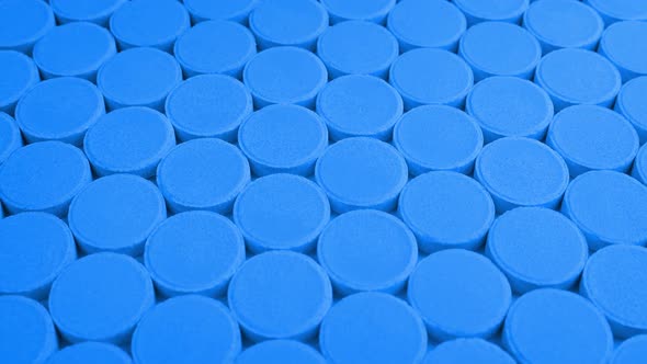 Passing Rows Of Blue Medical Pills