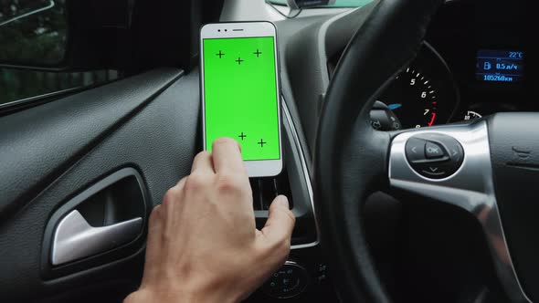 Phone on Car Dashboard Green Screen