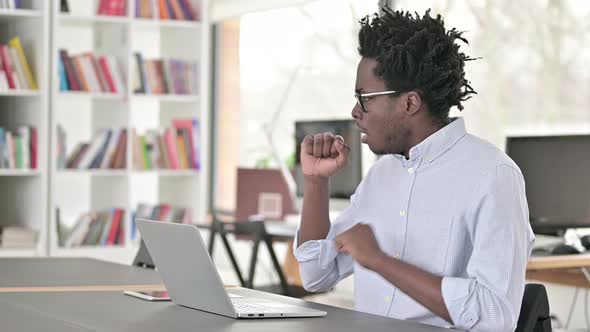 Cough, Coughing African Man Working on Laptop