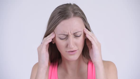 Face of Stressed Blonde Woman Having Headache