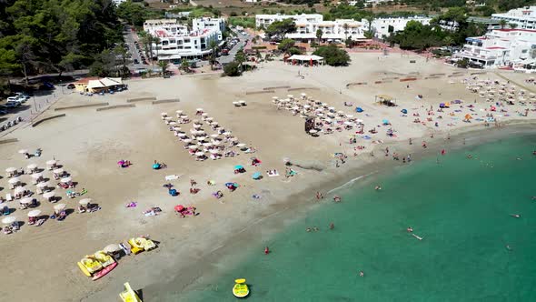 Aerial footage of the Spanish island of Ibiza showing the beautiful beach front