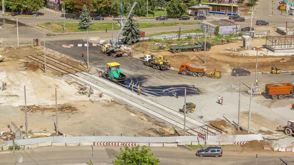 Asphalt Paver Roller and Truck on the Road Repair Site During Asphalting Timelapse