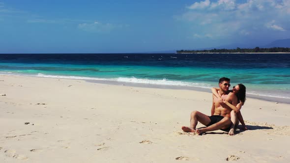 Happy Boy and Girl in Love Dating on Vacation Have Fun on Beach on Paradise White Sand Background