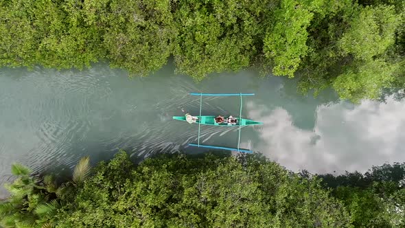 Aerial view of traditional fishing boat in Bojo River, Aloguinsan, Philippines.