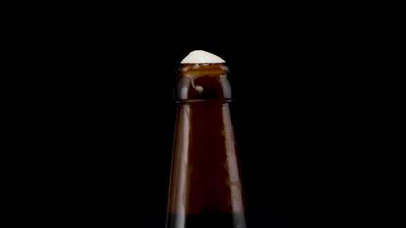 Beer Bottle on Black Background