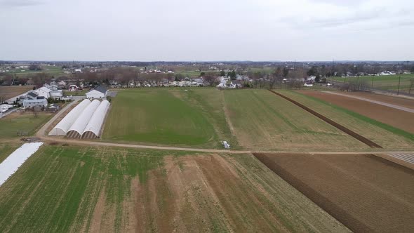 Aerial View of Amish Farm Lands being Ready for a New Growing Season