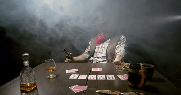 Tough cowboy is sitting at the poker table in the bar and smoking a cigar, 4k