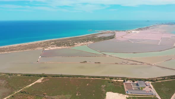 Multicolored Salt Lakes with Coastal Salt Marshes, Aerial View, Video Shooting with Drone