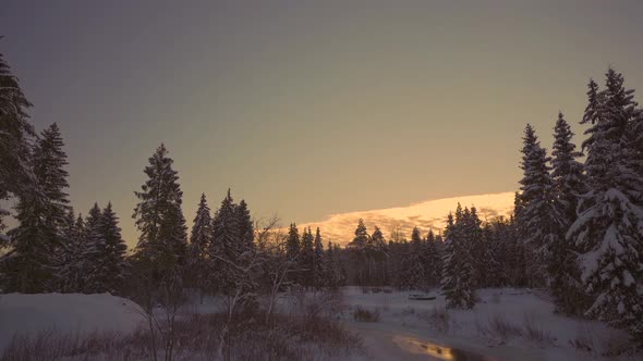 Amata river in winter at sunset in Latvia