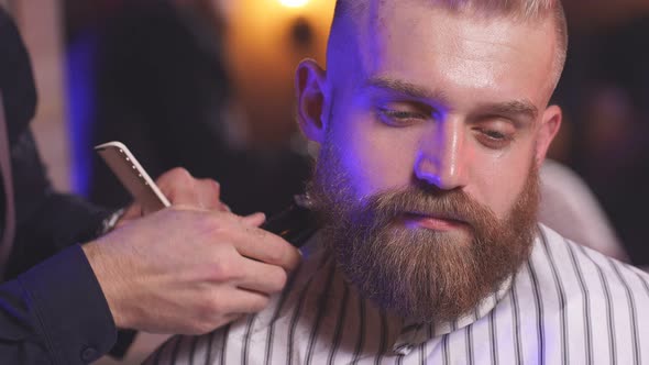 Male Barber Cut Hair To Elegant Stylish Man