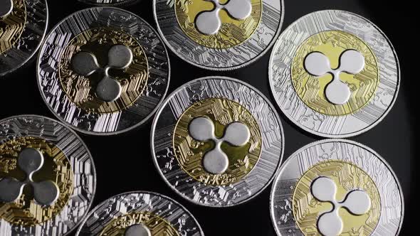 Rotating shot of Bitcoins (digital cryptocurrency)