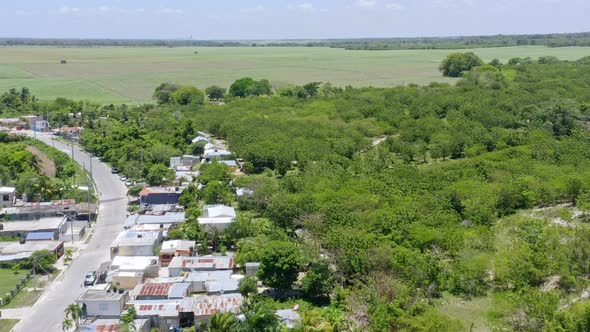 Sugar cane fields at San Pedro de Macoris in Dominican Republic. Aerial forward