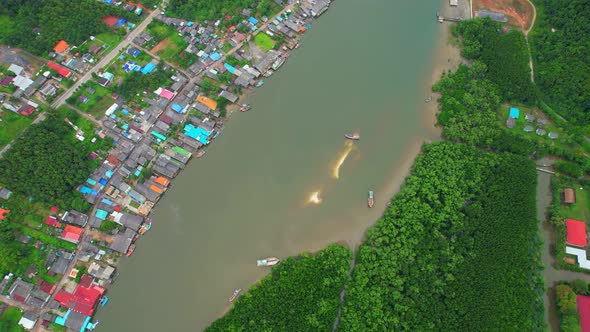 A drone is flying over a fishing village