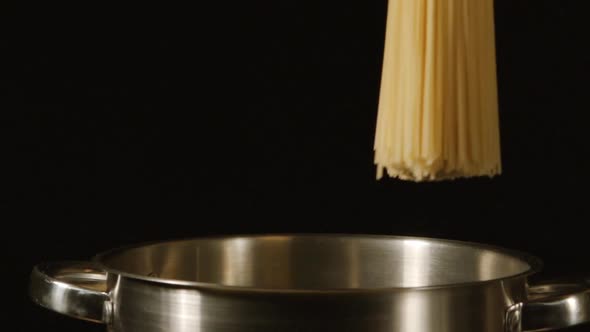 Bunch Of A Spaghetti Falls In A Steel Pot