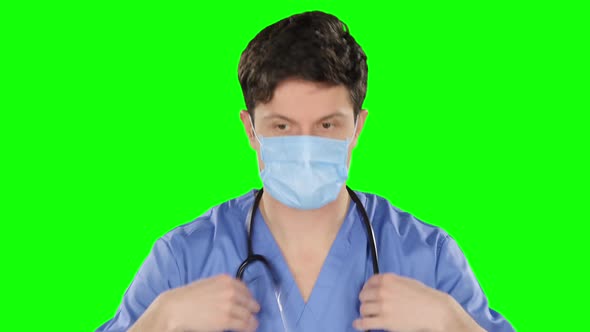 Doctor Puts on Stethoscope, Green Screen