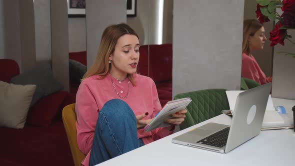 Dissatisfied Angry Woman Studying and Speaking on Video Chatting on Laptop at Home Office Freelance