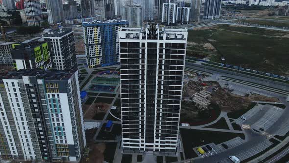 Construction of a modern city block. Multi-storey buildings