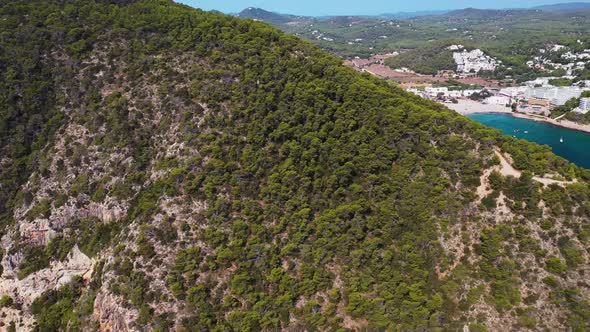 Aerial footage of the Spanish island of Ibiza showing the beautiful beach front