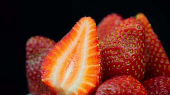 Strawberries close-up, macro. Berries rotate on their axis.