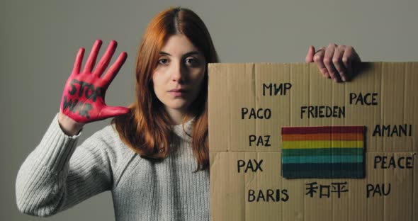 Girl Raises Peace Sign in Protest