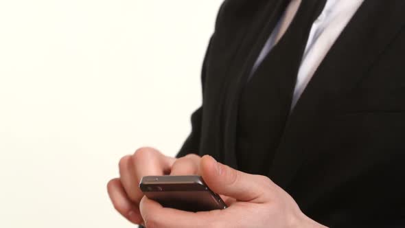 Businessman Using His Smart Phone on White