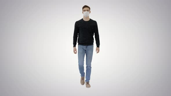 Student in Antiviral Mask Walking on Gradient Background.