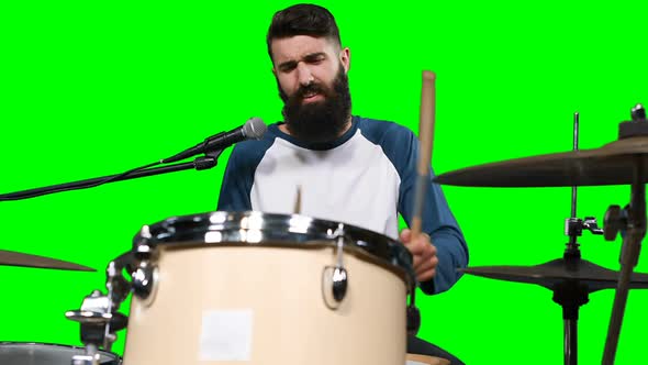 Male drumer playing drum