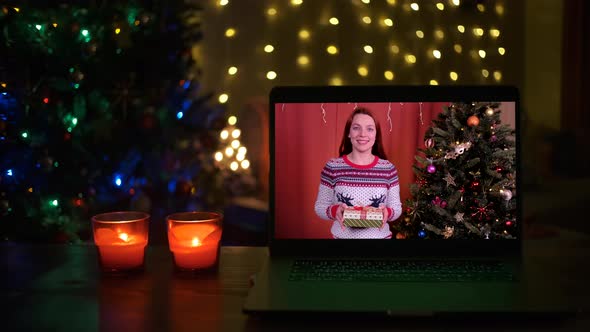 Happy Young Woman Give Xmas Gift Box